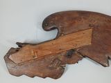 a piece of wood with a piece of wood sticking out of it