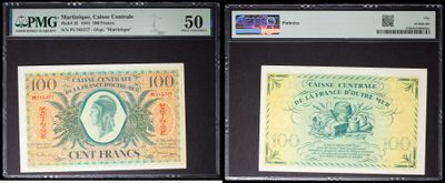 three different types of currency are on display in a display case