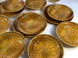 a lot of bowls that are sitting on a table