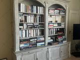 a large book case with many books on it