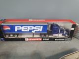 a pepsi semi truck with a pepsi logo on it