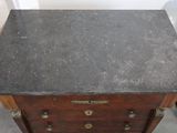 an image of a marble top chest of drawers