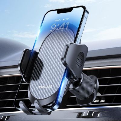 une photo d'un support de téléphone fixé au tableau de bord d'une voiture