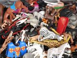 many different types of toy animals in this box