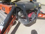 a small engine on the back of a truck