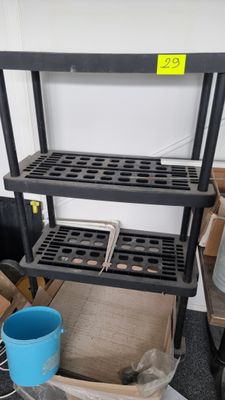 a shelf that has a bunch of tools on it