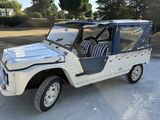 an image of a white jeep parked in a parking lot