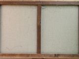 a picture of an old window with a wooden frame