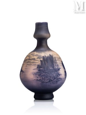 a vase with a picture of a boat in the water