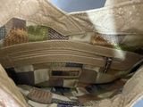 a close up of a bag with a zipper on it