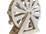 a wooden model of a ferris wheel on a stand