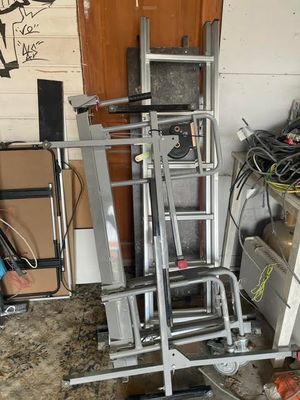 a pile of assorted items in a garage