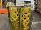 a close up of a cart with two yellow boxes on top of it