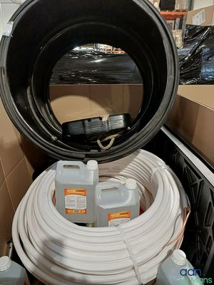 an image of a box with a bunch of hoses inside of it