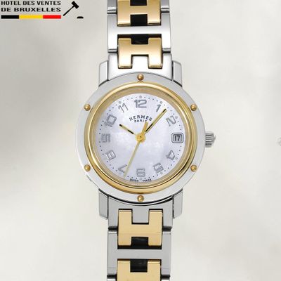 an image of a close up of a wrist watch on a white background