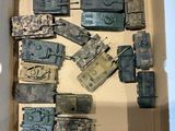a box full of different types of toy military vehicles