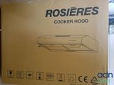 the box is open to show the contents of a cooker hood