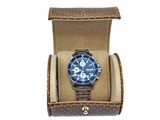 brown leather watch case with a watch inside of it on a white background