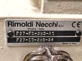 a close up of a sewing machine with a label on it