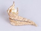 gold leaf brooch with pearl