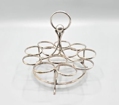 a silver plate with a flower design on it
