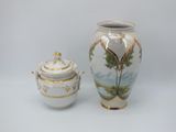 two vases that are next to each other on a table