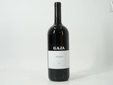 a bottle of wine that is sitting on a table