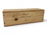the wooden box is holding a bottle of wine on a white background