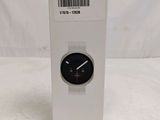 a close up of a box with a watch inside of it