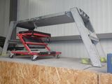 une photo d'une plate-forme de travail surmontée d'une échelle