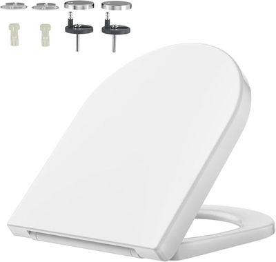 a close up of a toilet seat with the lid closed