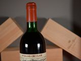 a bottle of wine that is sitting on a table