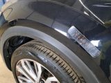 a close up of a car with a sticker on the side of it