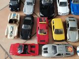 a lot of toy cars that are on the floor