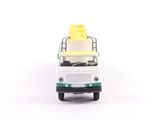 a toy bus with a surfboard on top of it