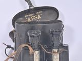 a black bag with a pair of binoculars in it