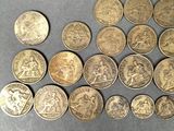 a close up of a bunch of coins on a table