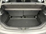 a trunk of a car with the seats folded down