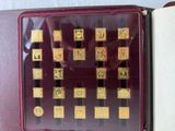 a red case with a chess board inside of it