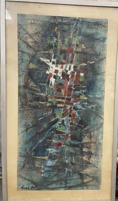 framed painting of a painting of a cityscape in a white frame