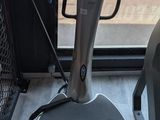 a machine that is sitting on the floor in front of a window