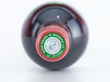 a bottle of wine that is sitting on a table