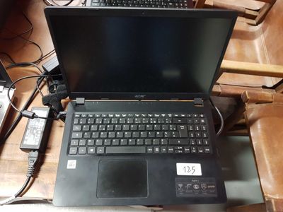 a laptop computer that is sitting on a table