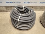 two hoses sitting next to each other on the floor