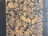 painting of a black and gold abstract painting on a black background