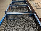 a large amount of wires in a blue crate