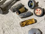 a lot of tools that are laying out on the ground