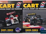 two racing cars on the cover of a magazine