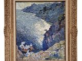 un tableau représentant deux personnes assises sur une falaise surplombant l'océan
