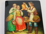 a picture of a plate with a painting of a man and a woman